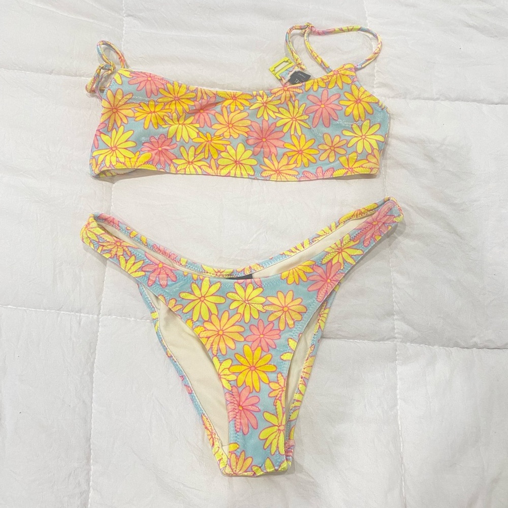 Triangl bikini set. Never worn. Top size small and bottom size x-small
